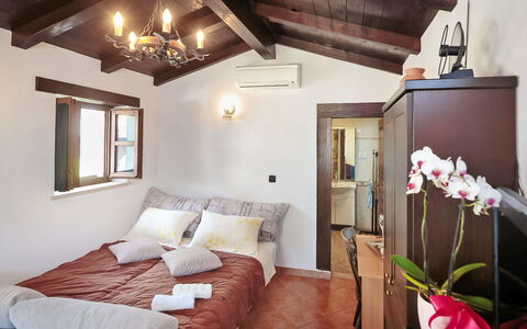 Lišera: Bedroom, Room, Furniture, Property, Bed, Ceiling, Interior Design, Building, Bed Sheet, Suite