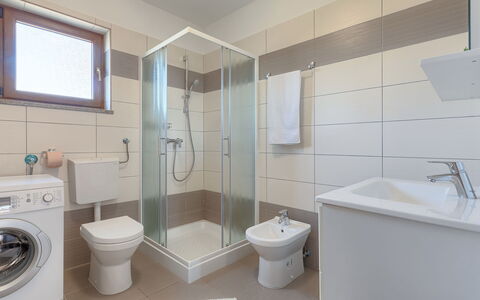 Linden Tree: Plumbing Fixture, Mirror, Tap, Property, Bathroom Sink, Shower Head, Bathroom, Building, Toilet Seat, Bathroom Cabinet