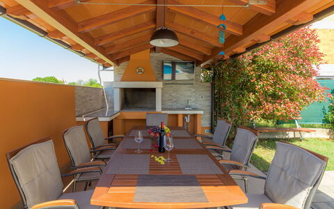 Linden Tree: Table, Furniture, Plant, Property, Chair, Building, Porch, Shade, Wood, Outdoor Furniture