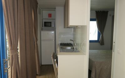 Centro Vacanze Prà delle Torri 4* 703.3: Cabinetry, Building, Kitchen Appliance, Wood, Curtain, Countertop, Flooring, Kitchen, Home Appliance