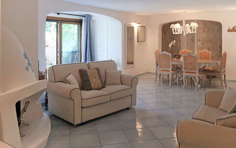 Omer: Furniture, Property, Couch, Comfort, Living Room, Interior Design, Wood, Floor, Flooring, Table