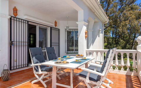 Villa Juna: Table, Furniture, Property, Building, Chair, Window, Interior Design, Wood, Shade, Porch