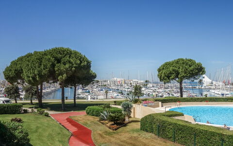 Port Camargue 30: Sky, Plant, Water, Property, Nature, Botany, Tree, Body Of Water, Urban Design, Leisure