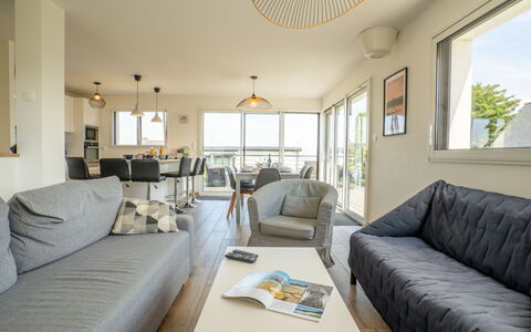Les Dunes: Table, Couch, Furniture, Comfort, Azure, Window, Interior Design, Building, Living Room, Pillow