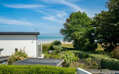 Les Dunes: Sky, Cloud, Plant, Property, Building, Shade, House, Vegetation, Road Surface, Architecture