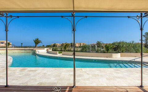 Presqu'île de la Lagune: Water, Property, Sky, Plant, Building, Swimming Pool, Rectangle, Azure, Shade, Outdoor Furniture