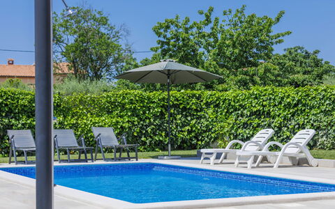 Villa Zirdum: Water, Plant, Sky, Swimming Pool, Azure, Nature, Building, Outdoor Furniture, Shade, Tree