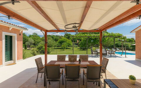 Villa Bernard: Table, Furniture, Property, Chair, Shade, Wood, Plant, Interior Design, Floor, Beam