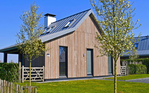 Oesterdam Resort: House, Home, Property, Residential Area, Building, Real Estate, Tree, Cottage, Siding, Architecture
