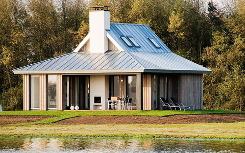 Oesterdam Resort: House, Home, Property, Building, Roof, Tree, Cottage, Rural Area, Architecture, Real Estate