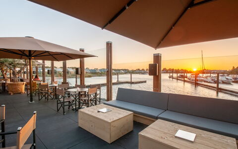 Oesterdam Resort: Property, Sky, Table, Shade, Lighting, Architecture, Outdoor Furniture, Wood, Chair, Leisure