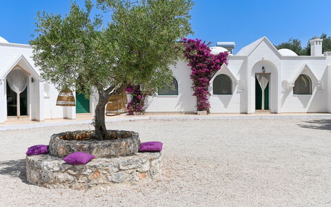 Borgo Marianna: Sky, Building, Plant, Property, Azure, Purple, House, Window, Arecales, Real Estate