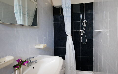 Villa Irene: Bathroom, Property, Room, Tile, Tap, Interior Design, Wall, Plumbing Fixture, Bathtub, Floor