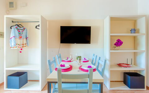 Villa Mezzaluna: Room, Furniture, Shelf, Pink, Interior Design, Table, Shelving, House, Floor, Living Room
