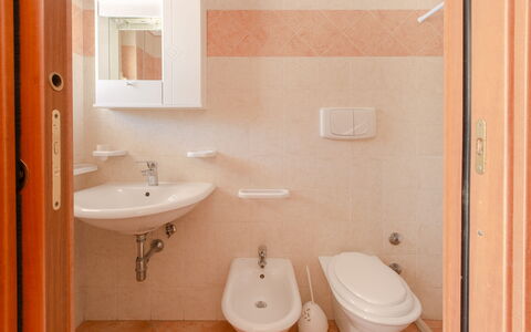 Villa Mezzaluna: Bathroom, Property, Room, Plumbing Fixture, Toilet, Wall, Toilet Seat, Tile, Bathroom Accessory, Architecture