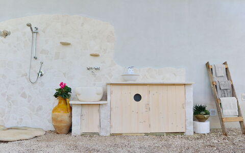 L'alcova: Yellow, Wall, Furniture, Room, Wood, Table, Door, Plant, Flower, Chest Of Drawers
