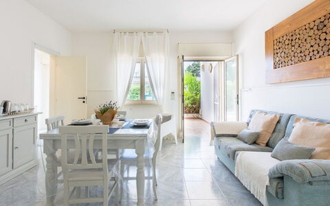Villa Nettuno: Property, Furniture, Room, Interior Design, Living Room, Building, Floor, House, Yellow, Table