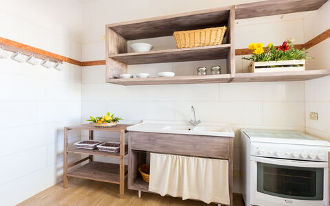 Villa Stelladali: Shelf, Furniture, Room, Property, Shelving, Interior Design, Floor, Kitchen, Cabinetry, Countertop