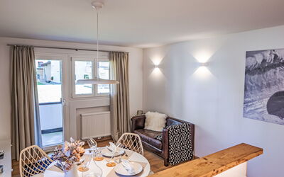 Chesa Palüdin 1 - Celerina 11.3: Table, Property, Tableware, Wood, Lighting, Interior Design, Floor, Flooring, Curtain, Living Room