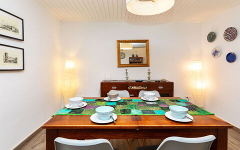 Cap de Tossa: Table, Furniture, Property, Picture Frame, Building, Chair, Kitchen & Dining Room Table, Tablecloth, Wood, Interior Design