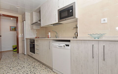 Magnolia: Property, Room, Kitchen, Cabinetry, Furniture, Interior Design, Yellow, Building, House, Countertop