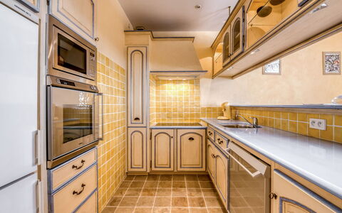 Saint-Tropez 260: Property, Room, Countertop, Yellow, Cabinetry, Building, Furniture, Kitchen, Floor, Interior Design