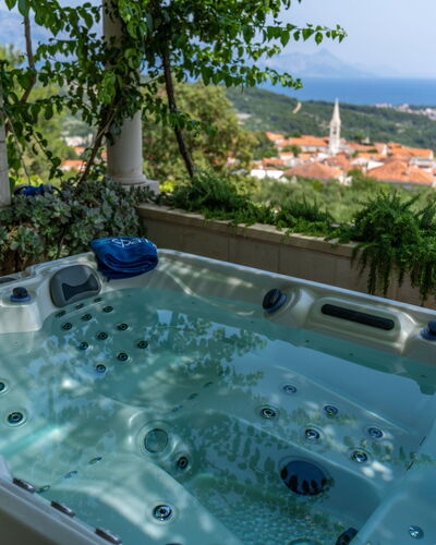Ivana: Property, Plant, Azure, Water, Building, House, Tree, Sky, Swimming Pool, Rectangle