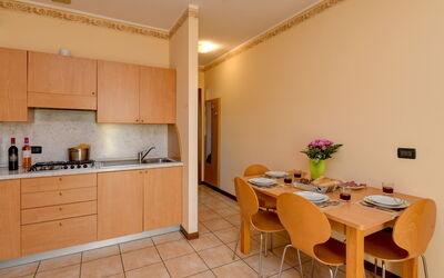 Gardagate - Garda Resort 6: Property, Room, Furniture, Building, Real Estate, Interior Design, Yellow, House, Kitchen, Floor