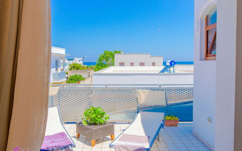 Appartamento Pineta Mare: Daytime, Property, Sky, Azure, Building, Shade, Interior Design, Urban Design, House, Neighbourhood