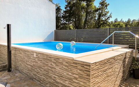 Milka 2: Azure, Building, Sky, Plant, Rectangle, Tree, Shade, Wood, Composite Material, Swimming Pool