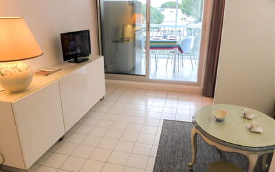Les Flamants Roses 180.8: Furniture, Table, Wood, Window, Interior Design, Building, Living Room, Lamp, Flooring, Floor