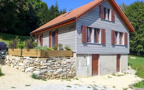 Chalet la Frêtaz: Plant, Sky, Property, Window, Building, Tree, House, Land Lot, Wood, Cottage