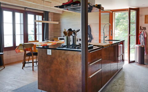 Chalet la Frêtaz: Furniture, Building, Wood, Window, Floor, Cabinetry, Flooring, Table, Plant, Hardwood