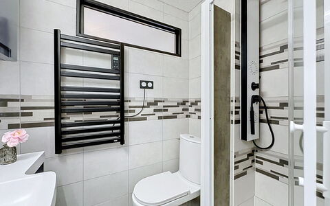 Dixie Land: Interior Design, Plumbing Fixture, Flooring, Bathroom, Floor, Plumbing, Toilet, Tile, Sink, Glass