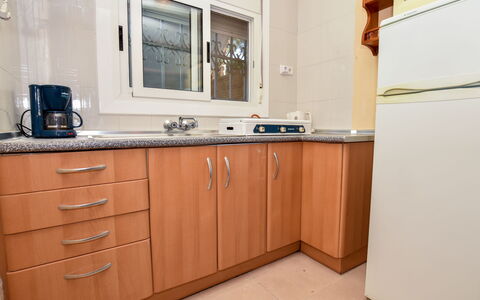 Burrito: Cabinetry, Countertop, Furniture, Building, Drawer, Tap, Chest Of Drawers, Wood, Kitchen, Kitchen Appliance