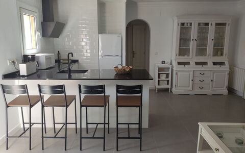 Golf Y Playa: Cabinetry, Property, Table, Furniture, Countertop, Chair, Wood, Kitchen, Interior Design, Flooring