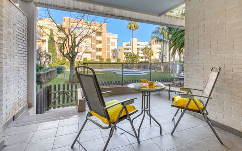 Zephyrus: Furniture, Table, Chair, Building, Plant, Shade, Outdoor Furniture, Outdoor Table, Wood, Architecture