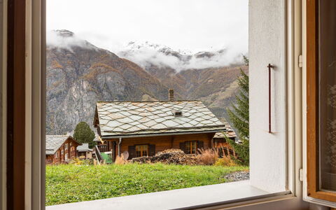 Heimine: Plant, Sky, Property, Window, Building, Cloud, Nature, Wood, Mountain, Rectangle