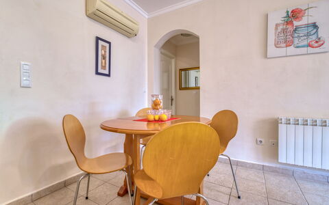 Alqueria Sol: Yellow, Room, Property, Real Estate, Furniture, Interior Design, Table, Building, House, Floor