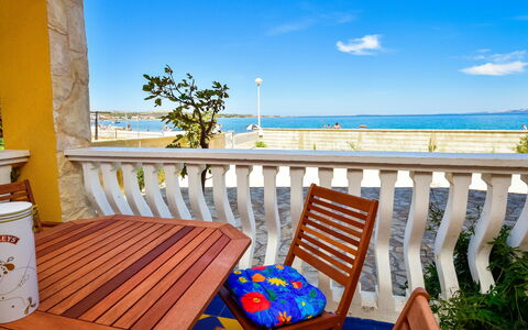 Fliri: Sky, Water, Furniture, Property, Cloud, Blue, Seaside Resort, Azure, Wood, Chair