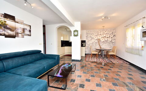 Fliri: Furniture, Picture Frame, Couch, Table, Interior Design, Flooring, Architecture, Building, Floor, Decoration