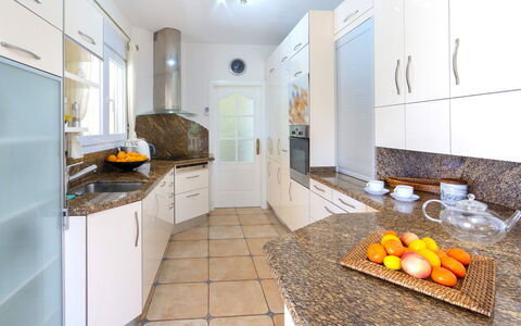 Del Pozo: Countertop, Room, Property, Yellow, Kitchen, Interior Design, Tile, Furniture, Floor, Building