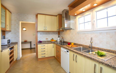 Nadine: Property, Room, Countertop, Kitchen, Cabinetry, Building, Furniture, Yellow, House, Interior Design