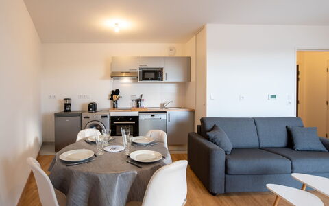 Les Cavaliers: Table, Furniture, Property, Couch, Wood, Picture Frame, Interior Design, Flooring, Building, Floor