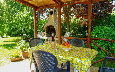 Podere Gioia: Property, Outdoor Table, Room, Building, Table, Real Estate, Patio, Furniture, Porch, House