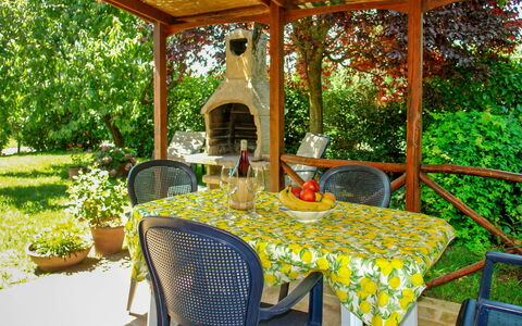 Podere Gioia: Plant, Furniture, Table, Botany, Chair, Outdoor Table, Shade, Outdoor Furniture, Real Estate, Tree