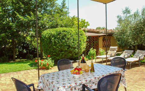 Podere Gioia: Plant, Table, Furniture, Property, Chair, Building, Tree, Flower, Outdoor Table, Outdoor Furniture
