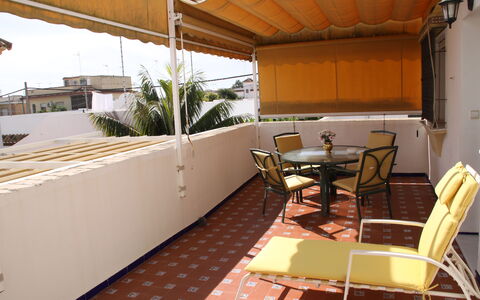 Apartamento Caracola: Property, Furniture, Chair, Wood, Shade, Table, Building, Interior Design, Flooring, Outdoor Furniture