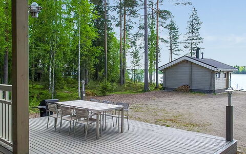 Villa Mari: Furniture, Chair, Outdoor Furniture, Table, Wood, Outdoor Table, Kitchen & Dining Room Table, Shade, Garden, Umbrella