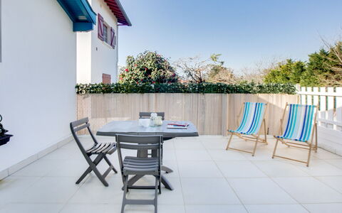 Etxe Tikia: Table, Furniture, Building, Sky, Property, Azure, Shade, Chair, Wood, Outdoor Furniture